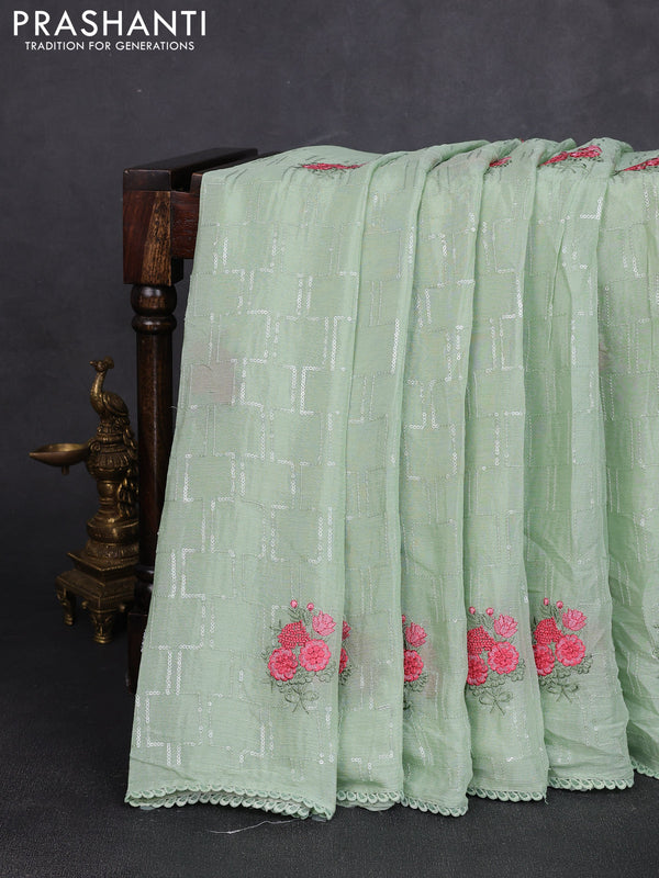 Chiffon saree pastel green with sequin embroidery work and lace work border