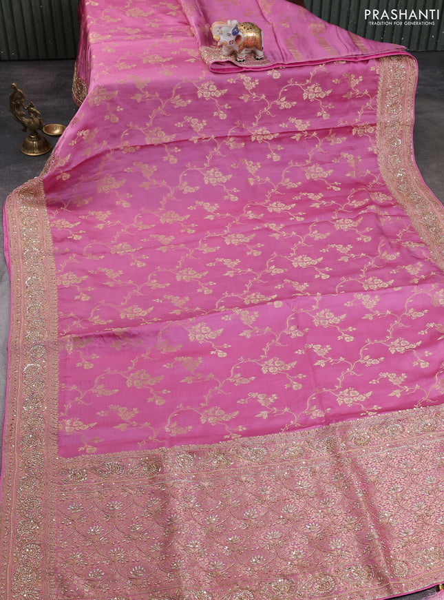 Banarasi silk saree light pink with allover zari woven weaves and zardosi work pallu & border