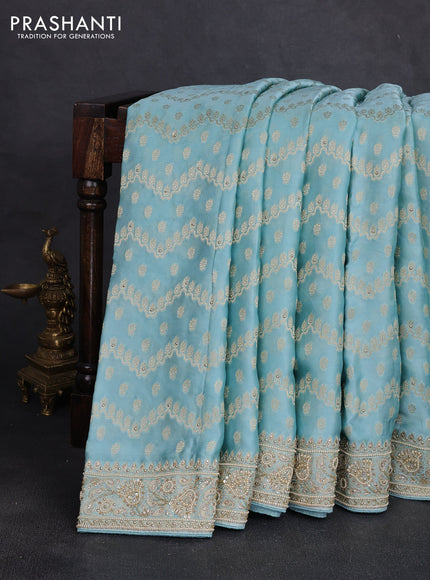 Banarasi silk saree pastel blue with allover zari woven weaves and zardosi work pallu & border