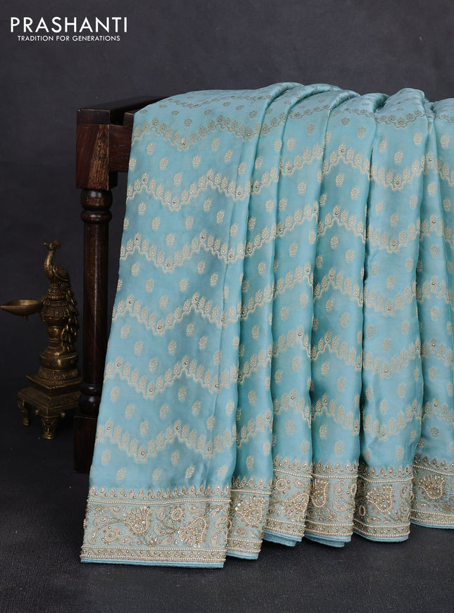 Banarasi silk saree pastel blue with allover zari woven weaves and zardosi work pallu & border