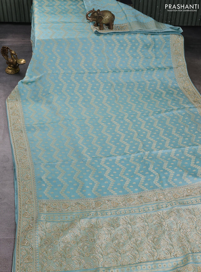 Banarasi silk saree pastel blue with allover zari woven weaves and zardosi work pallu & border