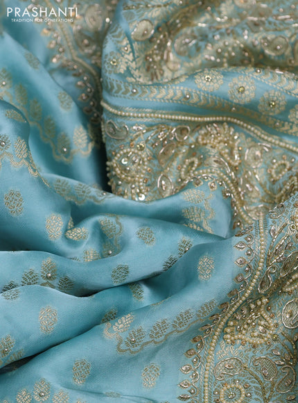 Banarasi silk saree pastel blue with allover zari woven weaves and zardosi work pallu & border