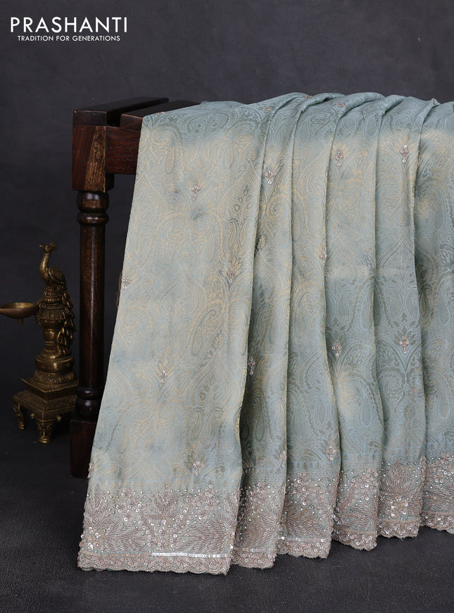 Banarasi silk saree pastel blue with allover zari woven brocade weaves and sequin work pallu & border