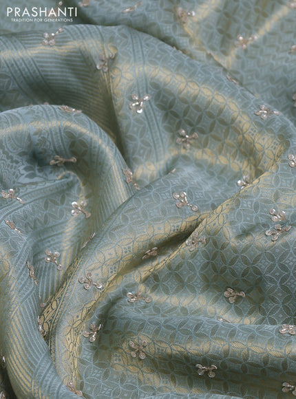 Banarasi silk saree pastel blue with allover zari woven brocade weaves and sequin work pallu & border