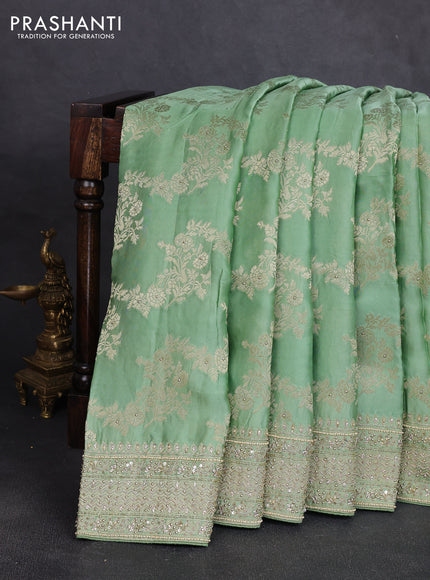 Banarasi silk saree pista green with allover zari woven weaves and zardosi work pallu & border