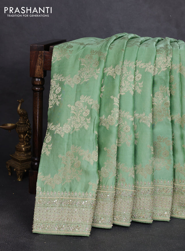 Banarasi silk saree pista green with allover zari woven weaves and zardosi work pallu & border