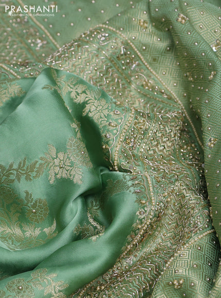 Banarasi silk saree pista green with allover zari woven weaves and zardosi work pallu & border