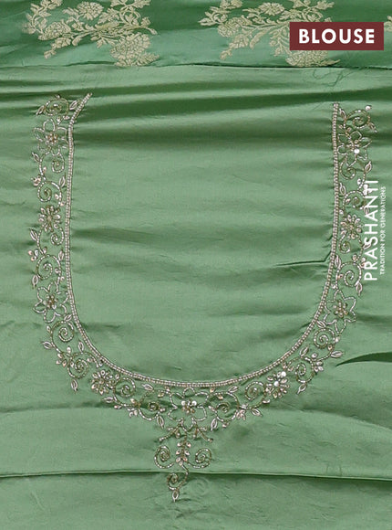 Banarasi silk saree pista green with allover zari woven weaves and zardosi work pallu & border