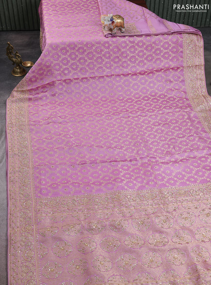 Banarasi silk saree mauve pink with allover zari woven floral weaves and zardosi work pallu & border