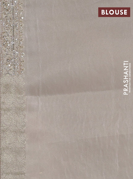 Banarasi silk saree beige shade with allover zari woven buttas and zardosi work pallu & border