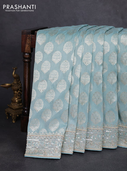 Banarasi silk saree pastel blue with allover zari woven buttas and zardosi work pallu & border