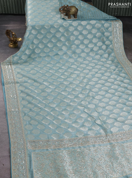 Banarasi silk saree pastel blue with allover zari woven buttas and zardosi work pallu & border