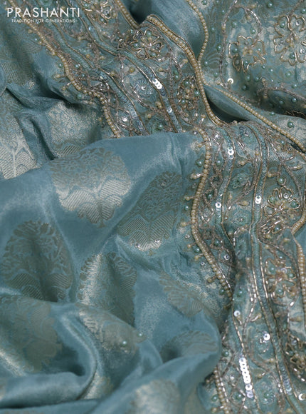 Banarasi silk saree pastel blue with allover zari woven buttas and zardosi work pallu & border