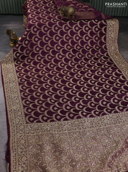 Banarasi silk saree wine shade with allover zari woven weaves and zardosi work pallu & border