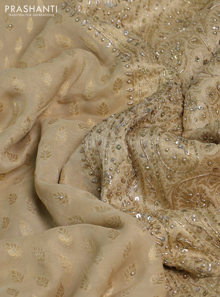 Banarasi silk saree beige with allover zari woven buttas and zardosi work pallu & border