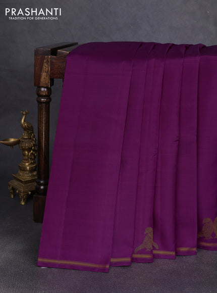 Pure kanchipuram silk saree purple with plain body and zari woven parrot butta border