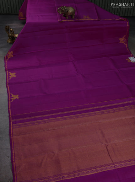 Pure kanchipuram silk saree purple with plain body and zari woven parrot butta border
