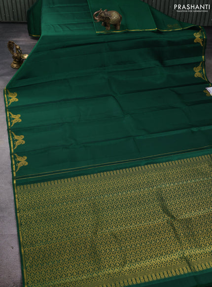 Pure kanchipuram silk saree green with plain body and zari woven parrot butta border