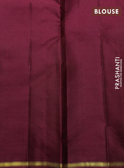 Pure kanchipuram silk saree wine shade with plain body and zari woven parrot butta border