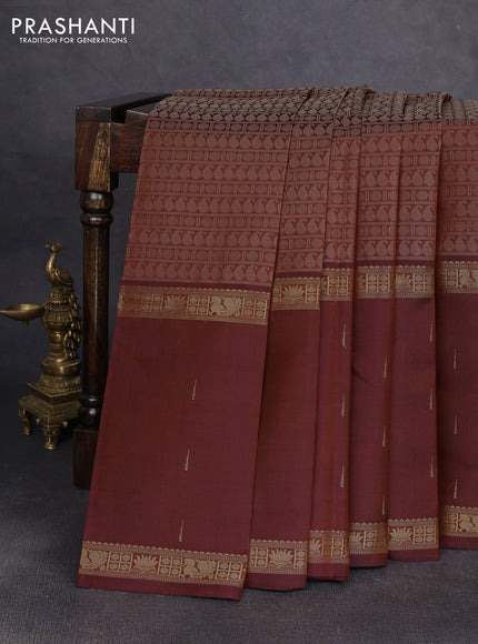 Pure kanchipuram silk saree rust shade with allover thread woven brocade weaves and long zari woven muniya butta border