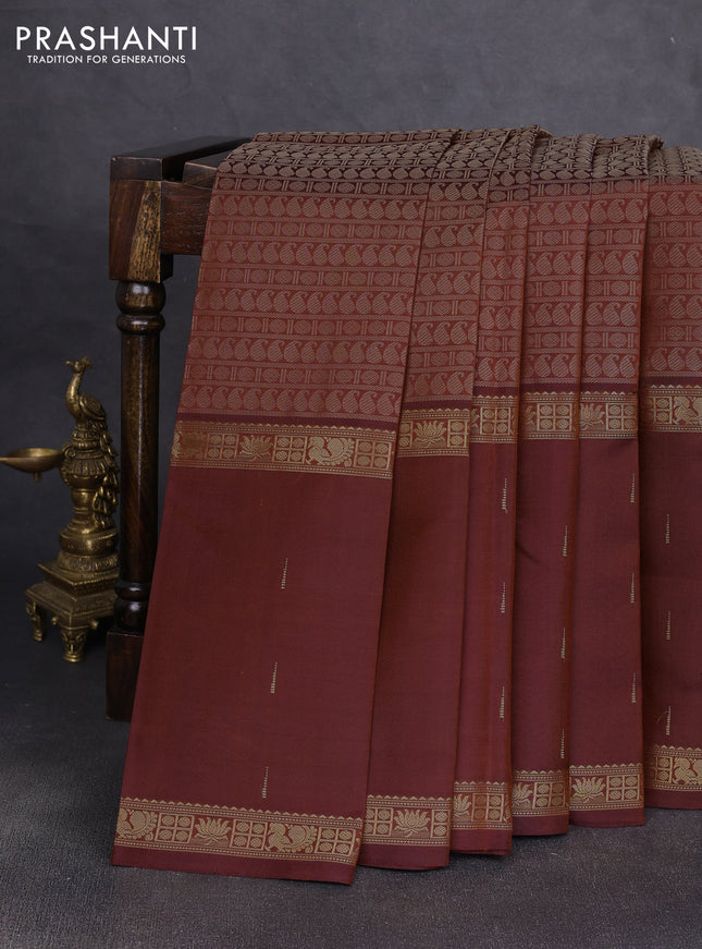 Pure kanchipuram silk saree rust shade with allover thread woven brocade weaves and long zari woven muniya butta border