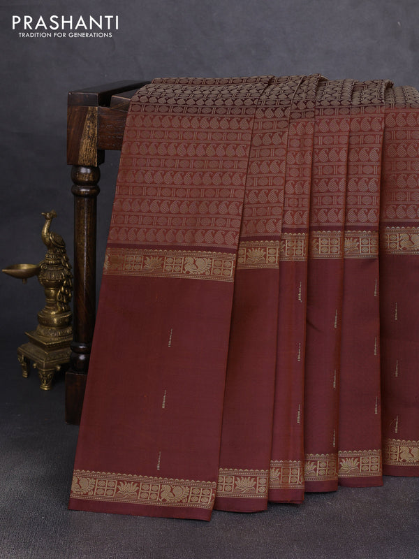 Pure kanchipuram silk saree rust shade with allover thread woven brocade weaves and long zari woven muniya butta border