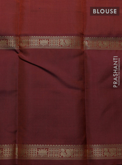 Pure kanchipuram silk saree rust shade with allover thread woven brocade weaves and long zari woven muniya butta border