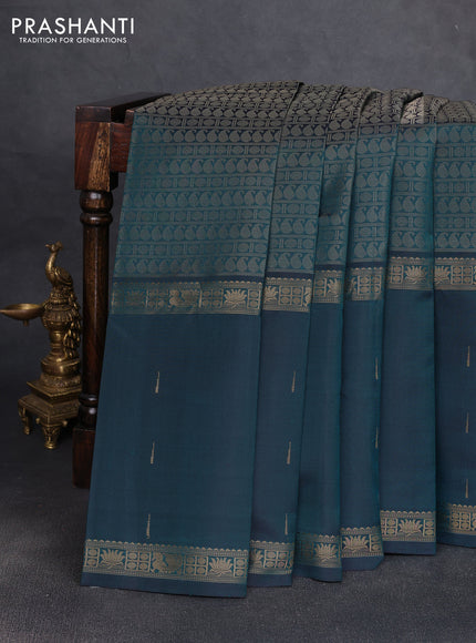 Pure kanchipuram silk saree peacock green with allover thread woven brocade weaves and long zari woven muniya butta border