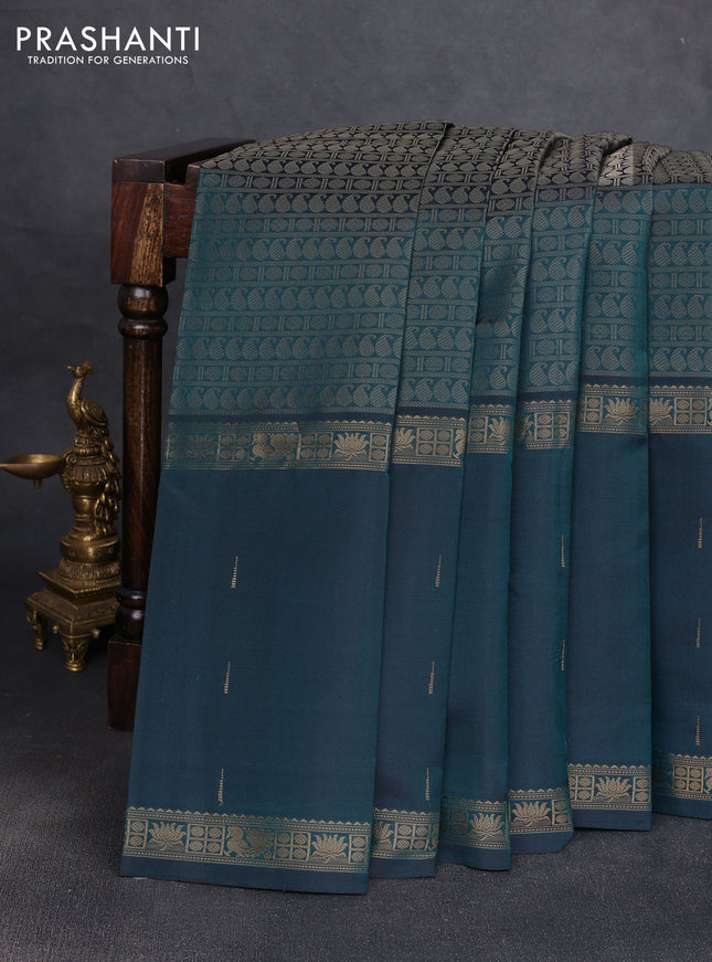 Pure kanchipuram silk saree peacock green with allover thread woven brocade weaves and long zari woven muniya butta border