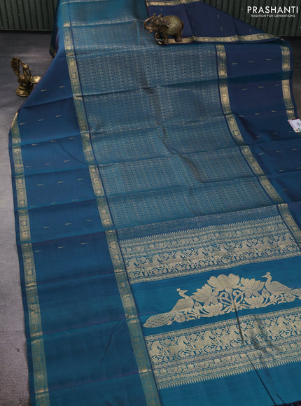 Pure kanchipuram silk saree peacock green with allover thread woven brocade weaves and long zari woven muniya butta border