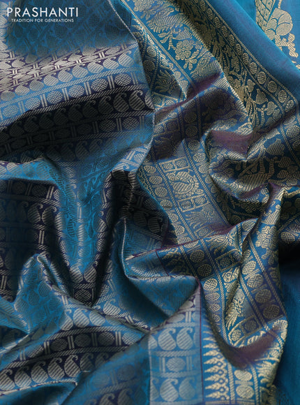 Pure kanchipuram silk saree peacock green with allover thread woven brocade weaves and long zari woven muniya butta border