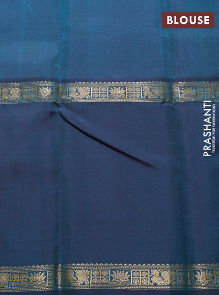 Pure kanchipuram silk saree peacock green with allover thread woven brocade weaves and long zari woven muniya butta border