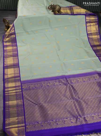 Pure kanchipuram silk saree pastel green and blue with zari woven buttas and rich zari woven korvai border