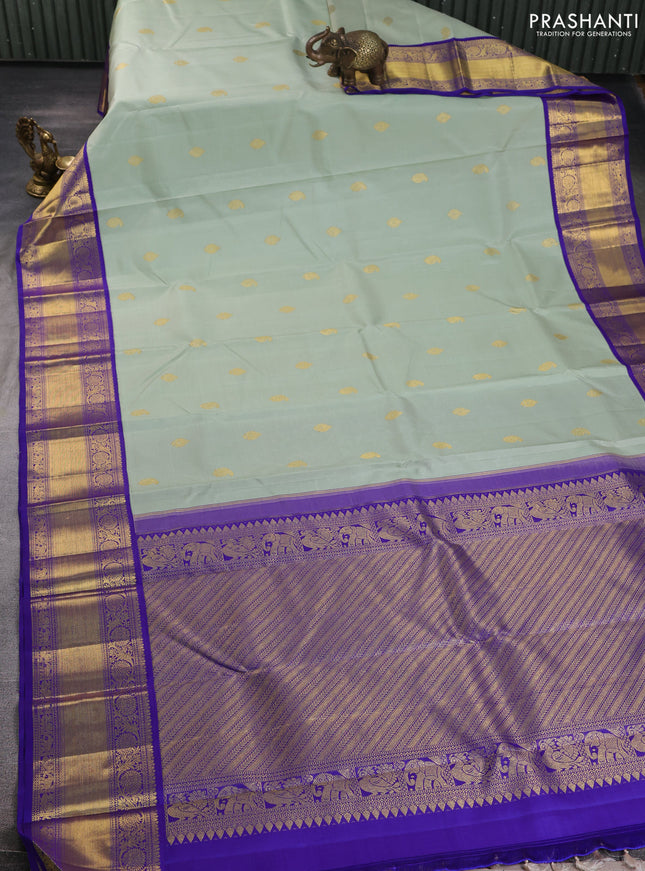 Pure kanchipuram silk saree pastel green and blue with zari woven buttas and rich zari woven korvai border