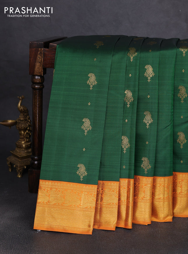 Pure kanchipuram silk saree green and dark mustard with zari woven buttas and rich zari woven korvai border