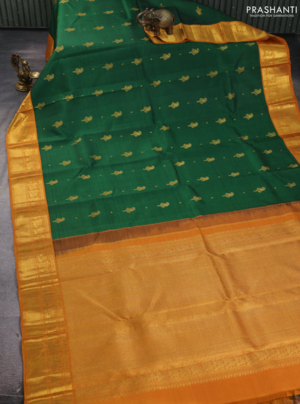 Pure kanchipuram silk saree green and dark mustard with zari woven buttas and rich zari woven korvai border