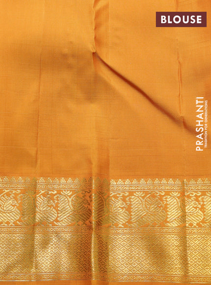 Pure kanchipuram silk saree green and dark mustard with zari woven buttas and rich zari woven korvai border