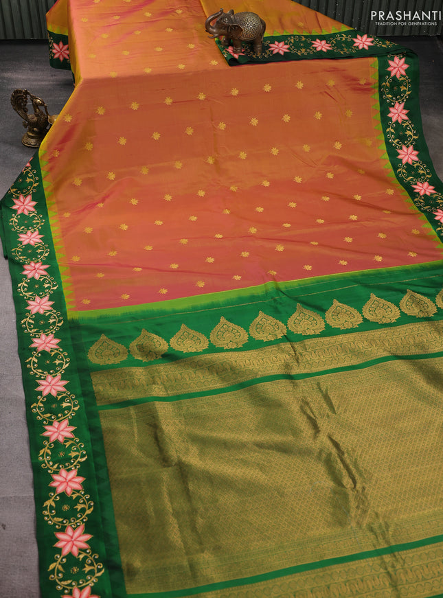 Pure gadwal silk saree dual shade of pinkish yellow and green with zari woven buttas and temple design tanjore painted border