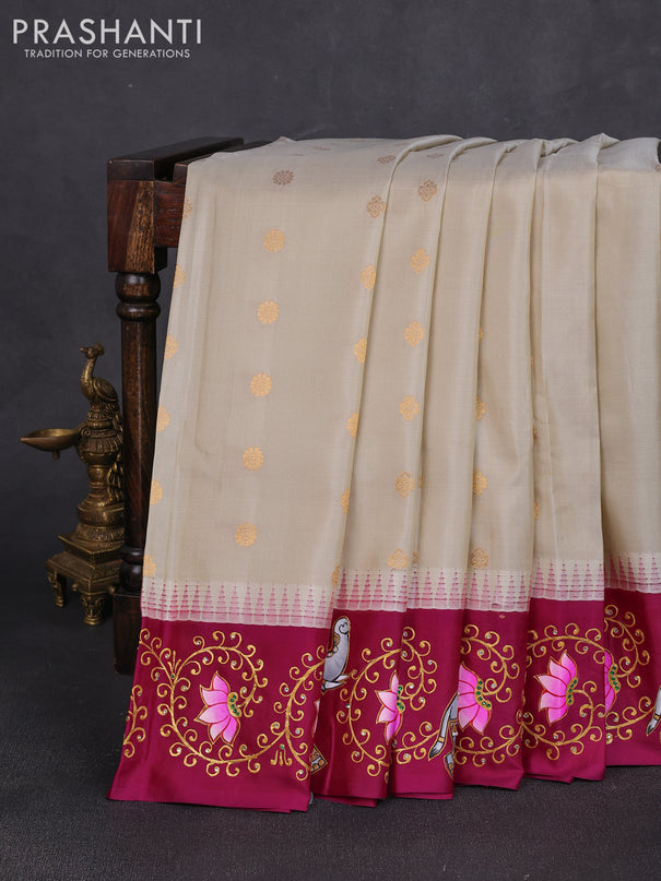 Pure gadwal silk saree cream and magenta pink with zari woven buttas and temple design tanjore painted border