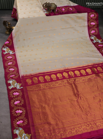 Pure gadwal silk saree cream and magenta pink with zari woven buttas and temple design tanjore painted border