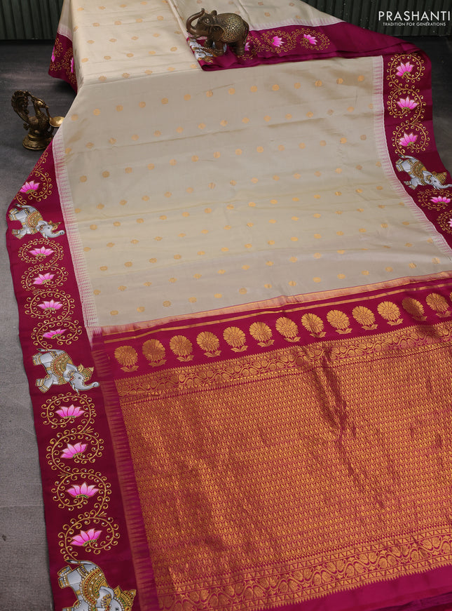 Pure gadwal silk saree cream and magenta pink with zari woven buttas and temple design tanjore painted border