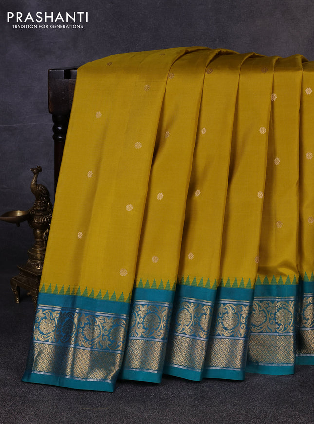 Pure gadwal silk saree lime green and teal green with allover zari woven buttas and temple design zari woven border