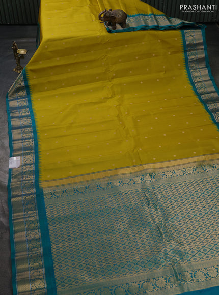 Pure gadwal silk saree lime green and teal green with allover zari woven buttas and temple design zari woven border