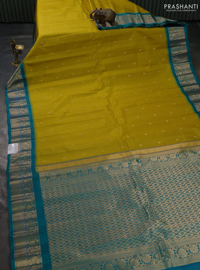 Pure gadwal silk saree lime green and teal green with allover zari woven buttas and temple design zari woven border