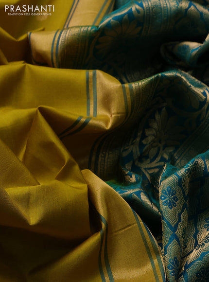 Pure gadwal silk saree lime green and teal green with allover zari woven buttas and temple design zari woven border