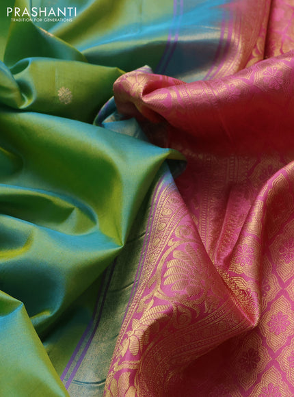 Pure gadwal silk saree dual shade of bluish yellow and peach pink with allover zari woven buttas and temple design zari woven border