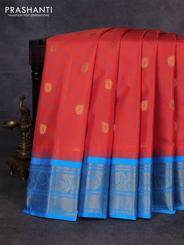 Pure gadwal silk saree orange and teal blue with allover checks & zari buttas and temple design zari woven border