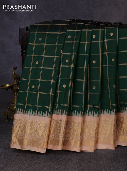 Pure gadwal silk saree bottle green and sandal with allover zari checks & buttas and temple design zari woven border