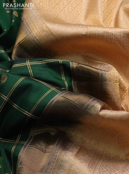 Pure gadwal silk saree bottle green and sandal with allover zari checks & buttas and temple design zari woven border