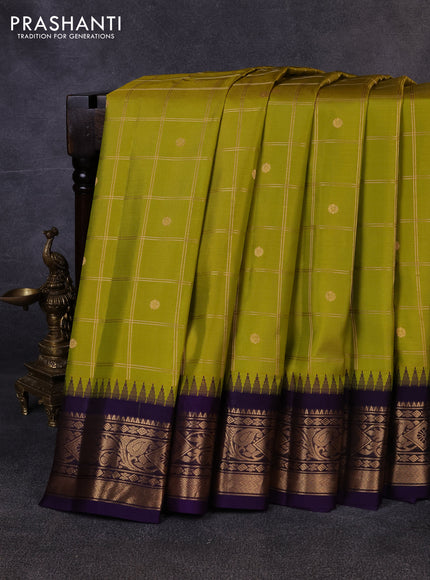 Pure gadwal silk saree lime green and violet with allover zari checks & buttas and temple design zari woven border